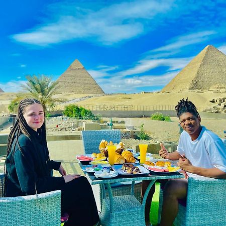 ホテル Blue Scarab Pyramids View カイロ エクステリア 写真
