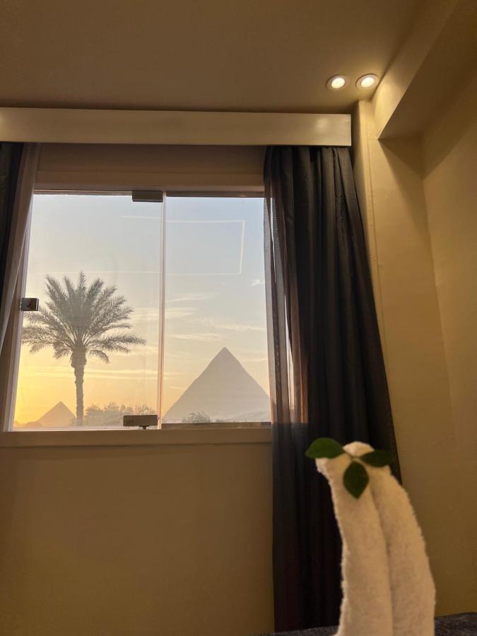 ホテル Blue Scarab Pyramids View カイロ エクステリア 写真