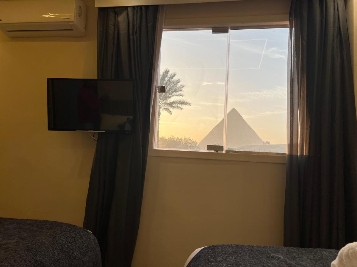 ホテル Blue Scarab Pyramids View カイロ エクステリア 写真